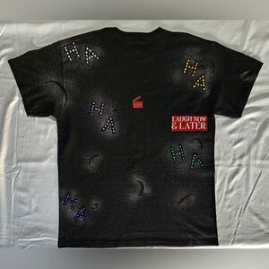 Black Graphic Tee with Colorful Accents